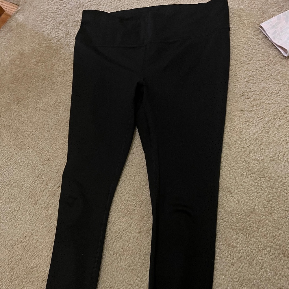 Athleta leggings with hole circle pattern